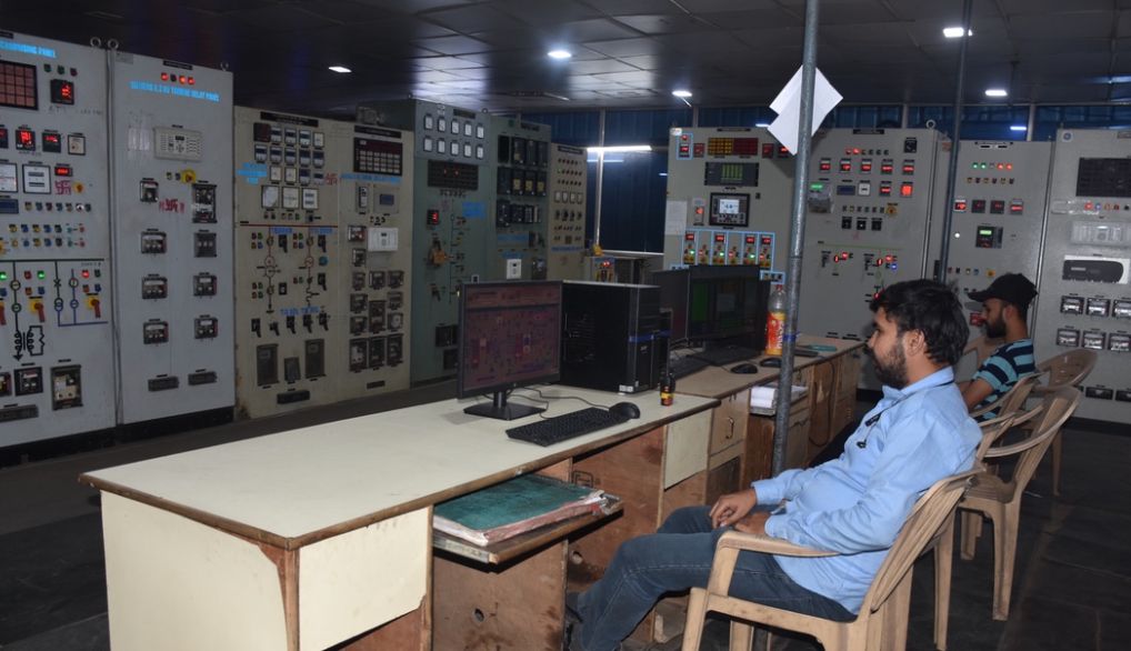 The cogeneration control room at Bachai, instrument panels along the wall